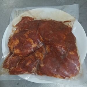 Fertig gewuerzte Halssteak
